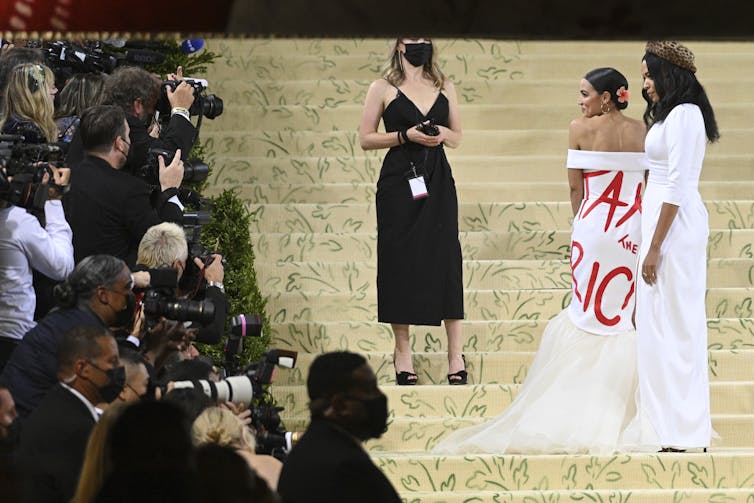 Alexandria Ocasio-Cortez on-message at New York City's high-society event the Met Gala in September 2021.