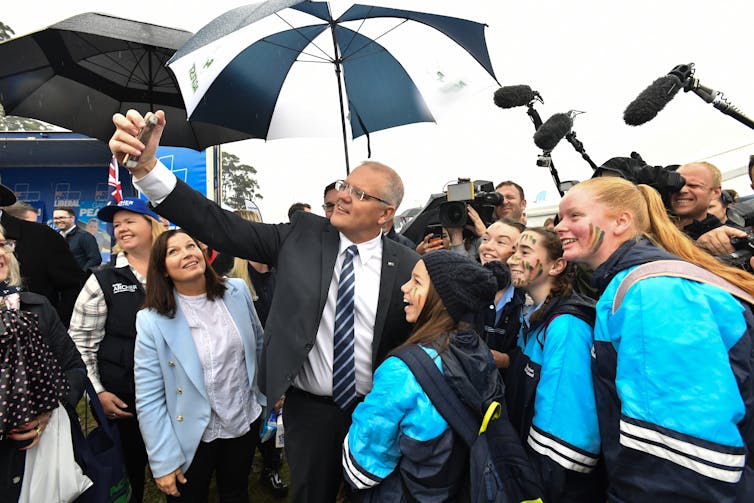 Scott Morrison with school students during the 2019 federal campaign.