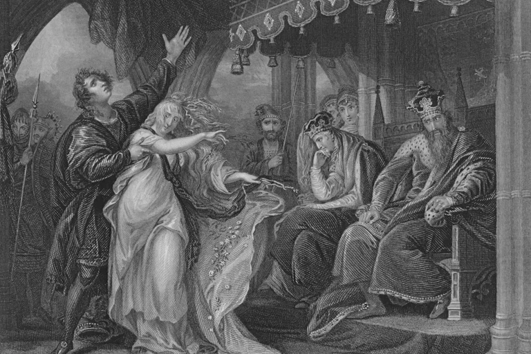 An all-male cast does a scene from Hamlet before a royal audience.