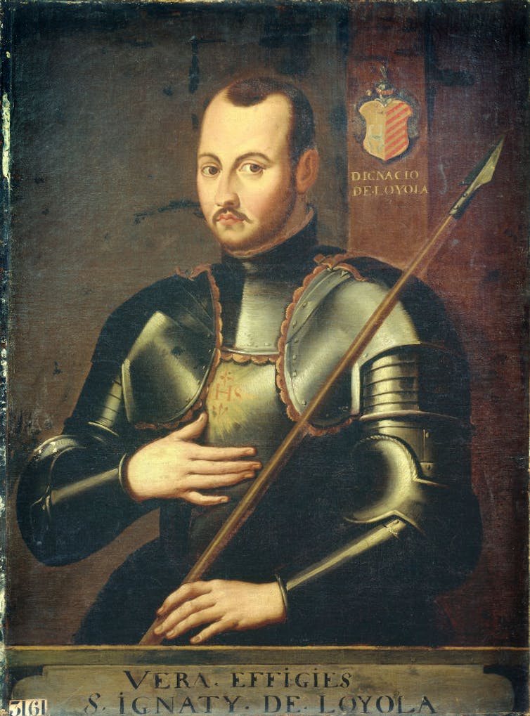 A painting shows a man posing in armour.
