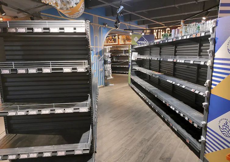 Empty shelves in a supermarket in Chernihiv, northern Ukraine.