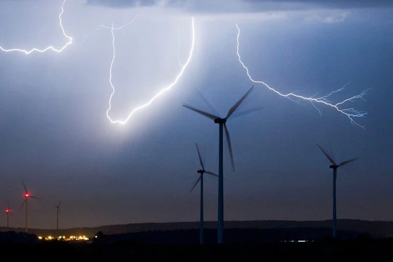 wind turbines in lightning storm