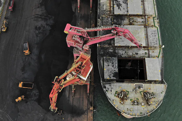 aerial view of coal loader and ship