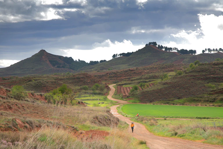 A person walks a trail.