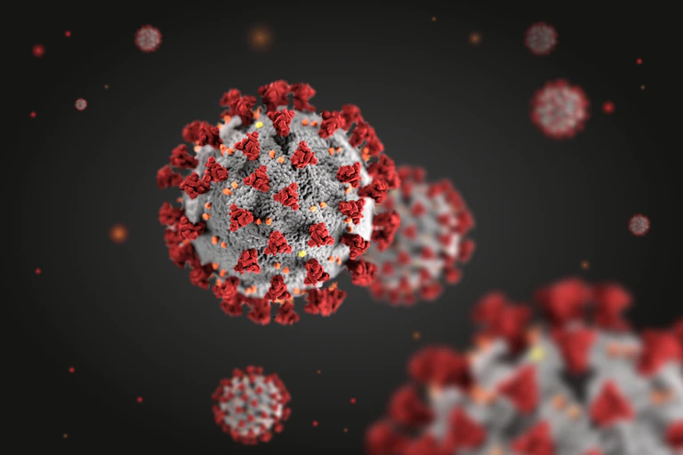 Three-dimensional illustration of coronavirus particles floating in a liquid environment.