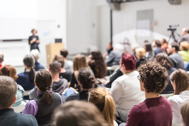 Mixed group of students listening to a lecture
