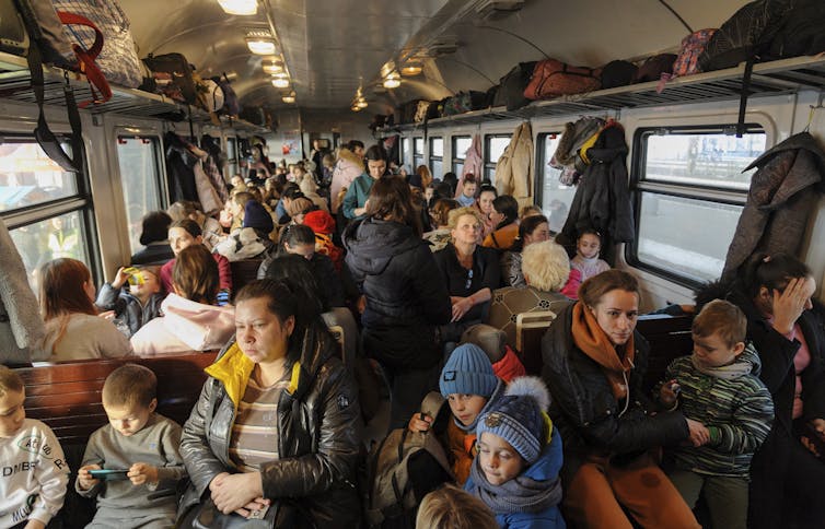 Ukrainian refugees leaving Lviv, bound for Poland.