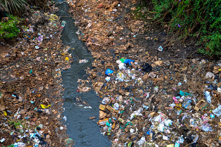 A river flows through Nairobi's Kibera slum