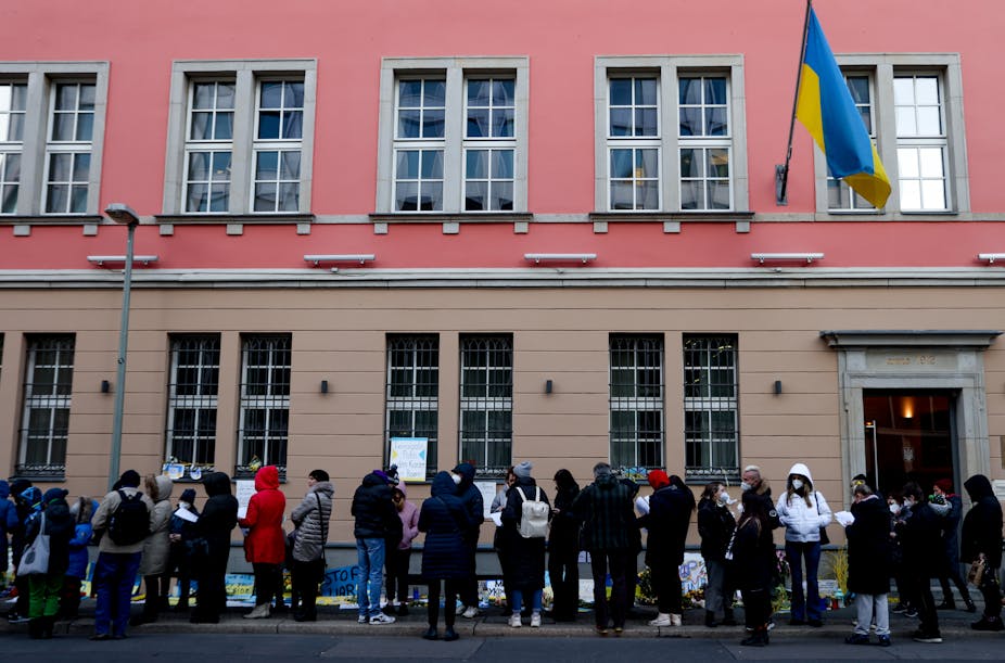 Ukrainians queuing for COVID vaccines outside the Ukrainian embassy in Berlin