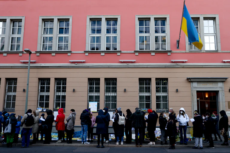 Ukrainians queuing for COVID vaccines outside the Ukrainian embassy in Berlin