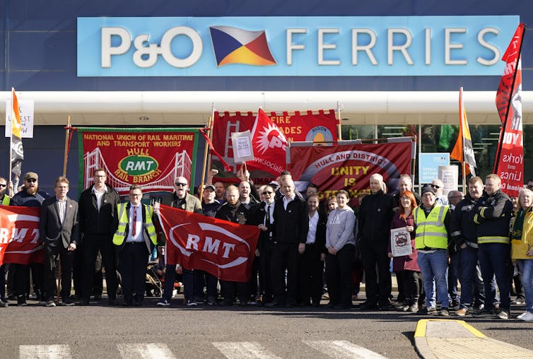 Protestors outside a P&O Ferries building.