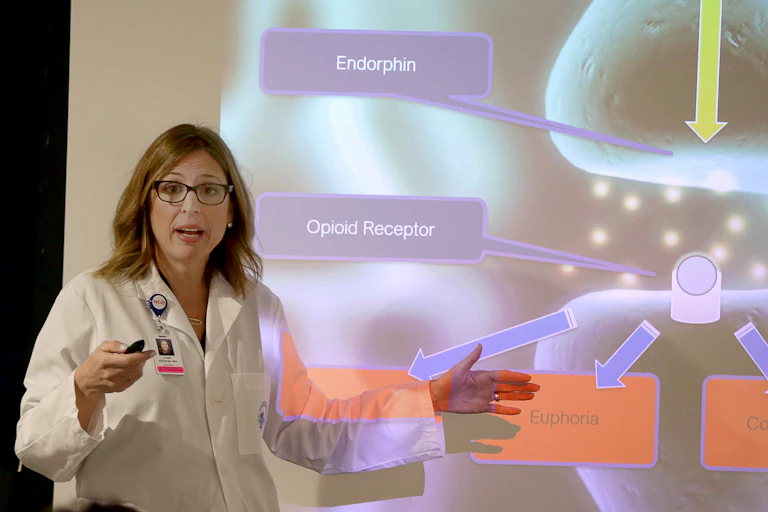 A doctor makes a presentation