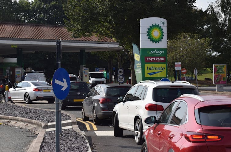 Cars queuing to use a BP garage