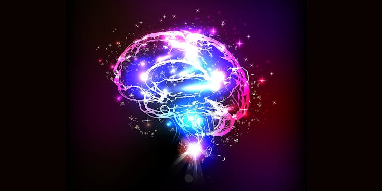 Illustration of a brain lit up with red and blue, against a black background.