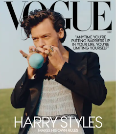 An image of the December 2020 Vogue cover featuring singer Harry Styles.