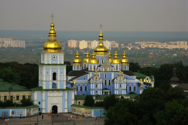 Ornate church building looming over cityscape
