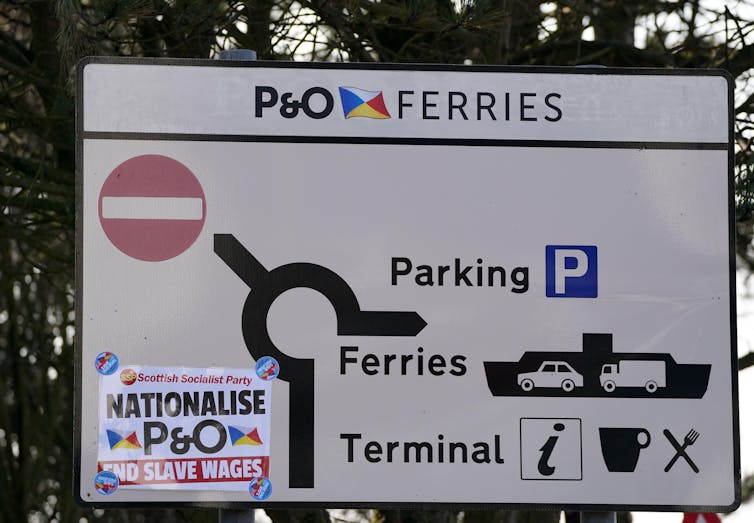 P&O Ferry road sign with protest poster attached.