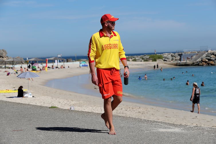 lifeguard patrols beach