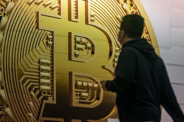 An advertisement displaying a Bitcoin cryptocurrency token