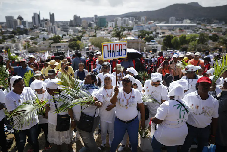 A group of people in an organised protest.