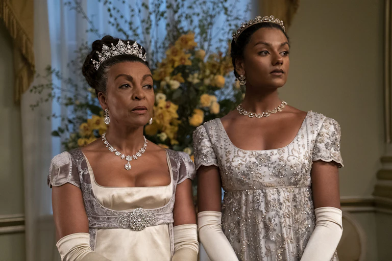 Two women in regency style dress