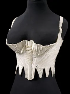 mannequin with a Regency corset on.