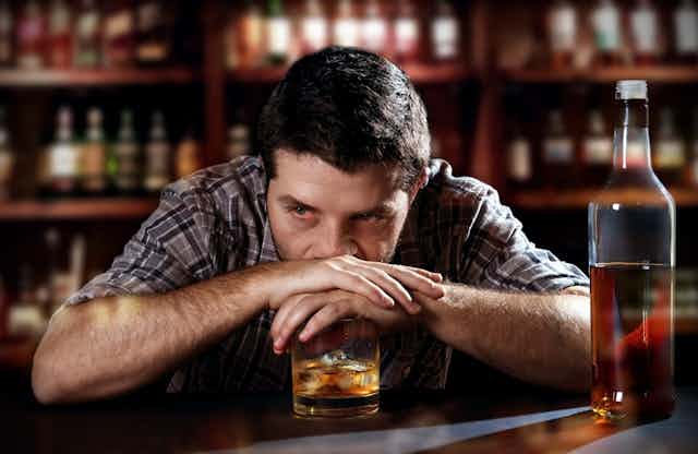 Image of a man drinking alcohol.