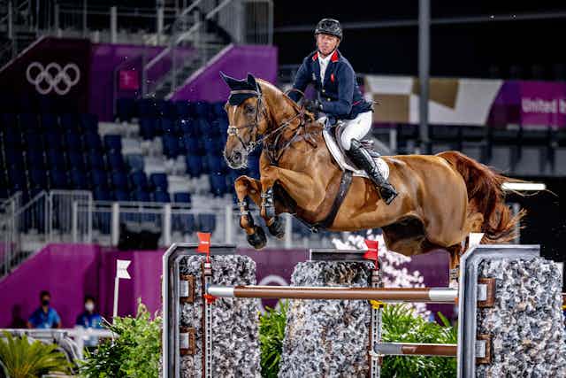 Gold medallist Britain's Ben Maher competes in jumping individual final during the Tokyo 2020 Olympic Games, at Equestrian Park