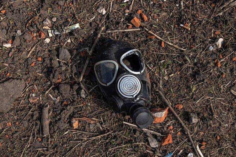Gas mask on the ground.