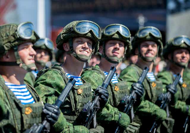 Russian soldiers wearing during a military parade, marking the 75th anniversary of the Nazi defeat, in Moscow, Russia, 24 June 2020.