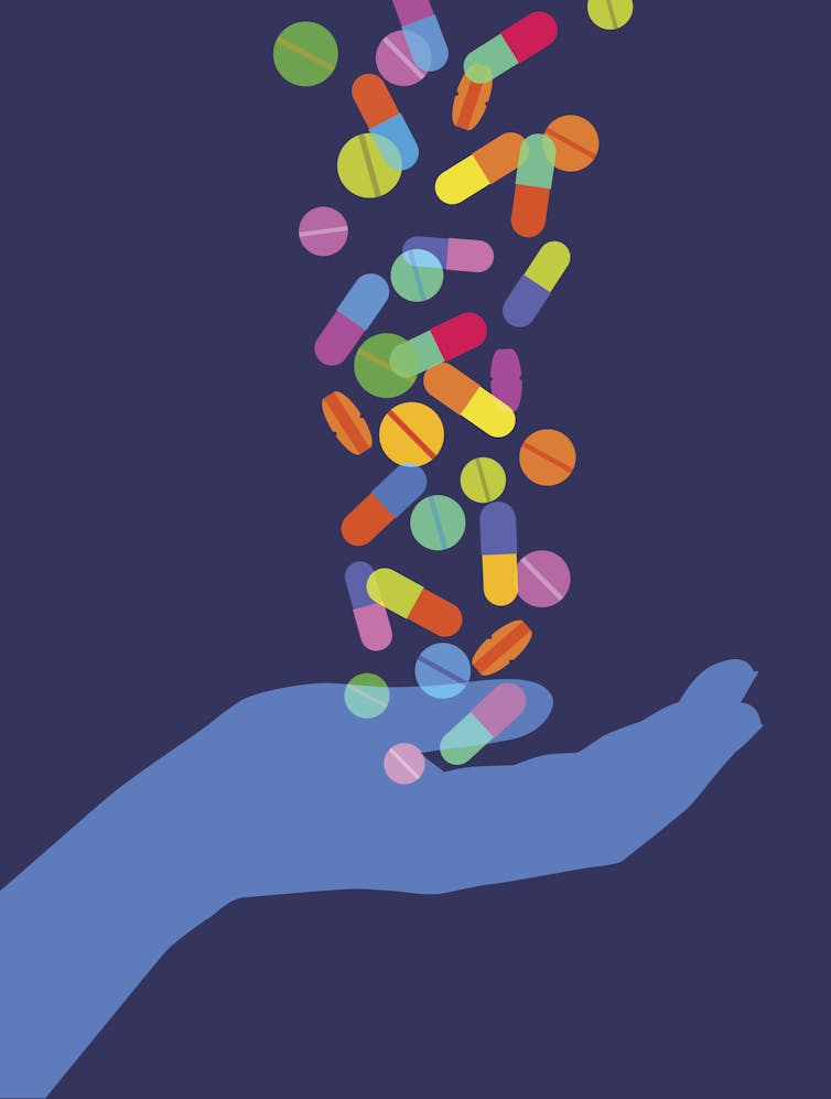 Illustration of various pills falling into an open hand