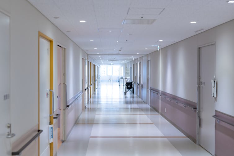 Empty corridor of a large elderly care center.