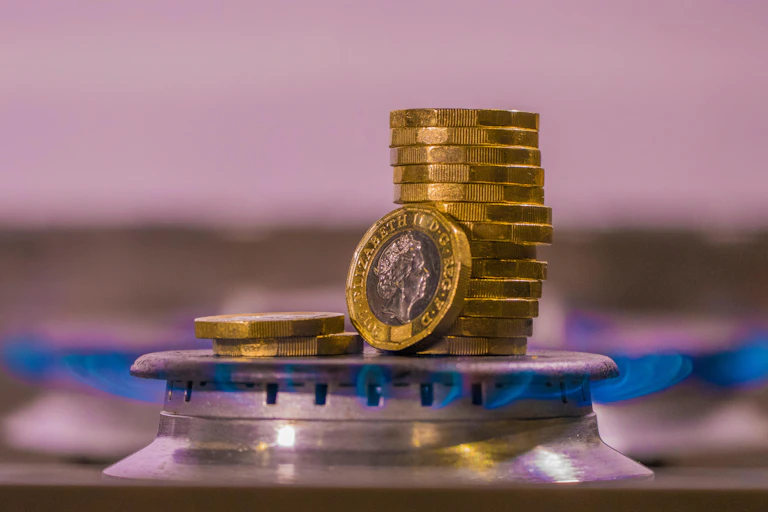 coins on a gas stove
