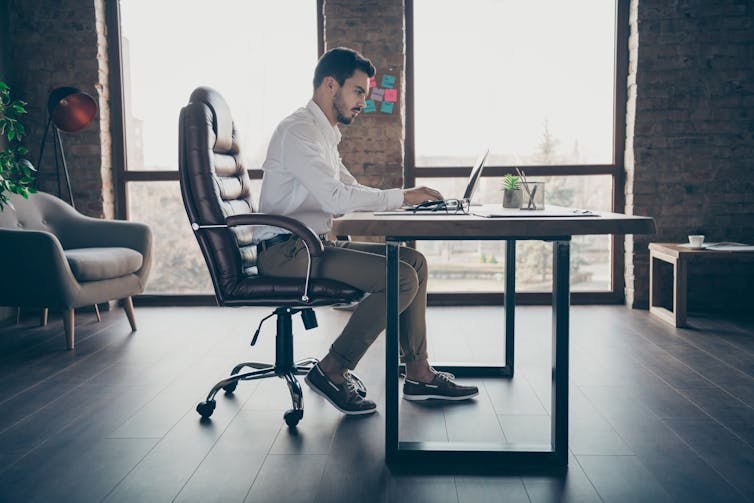 Man sitting at desk