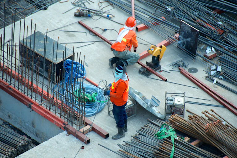 Two workers on a building site