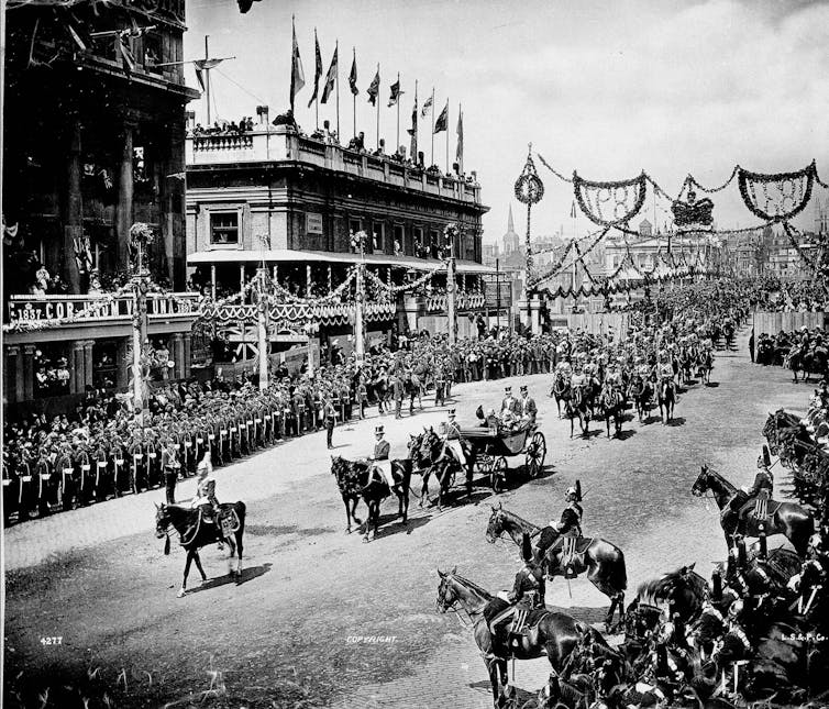 A black and white image of a parade