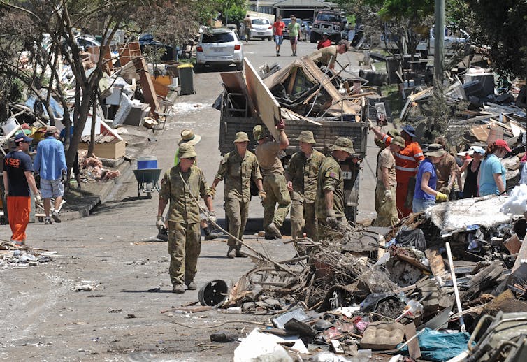 Australian army personnel help with clean-up work in inner western Brisbane on January 17 2011.