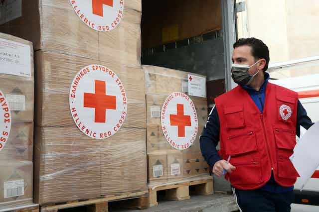 A Red Cross vehicle with boxes of aid for Ukraine.