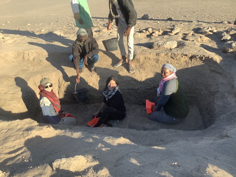 Scientists excavate an underground tomb