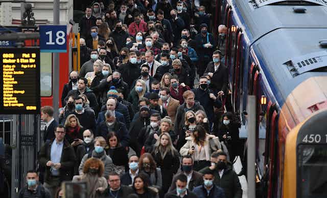 A crowded train platform in London.