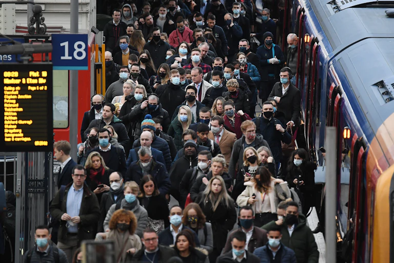 A crowded train platform in London.