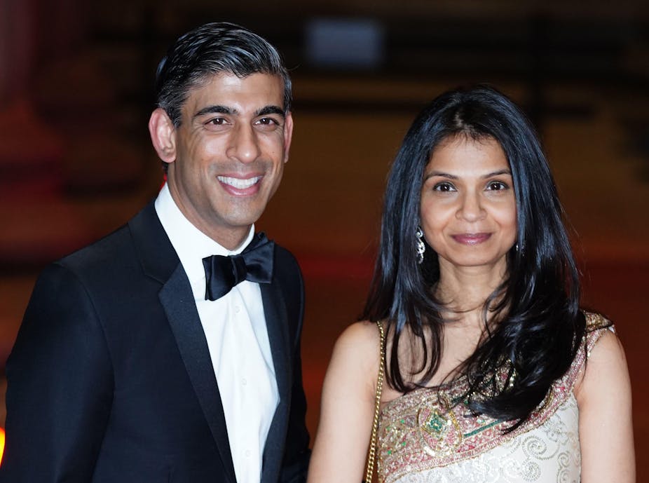 Chancellor Rishi Sunak and his wife Akshata Murty, in glamorous, formal clothes at an event