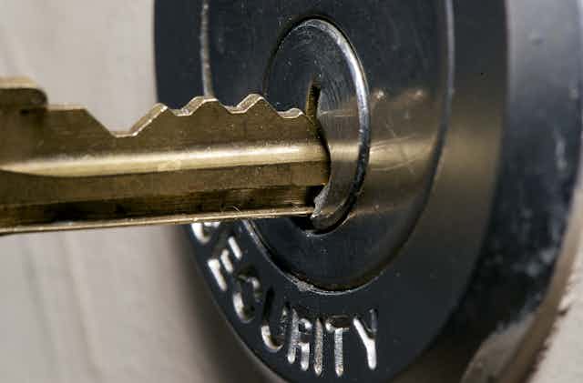 How do keys open locks?