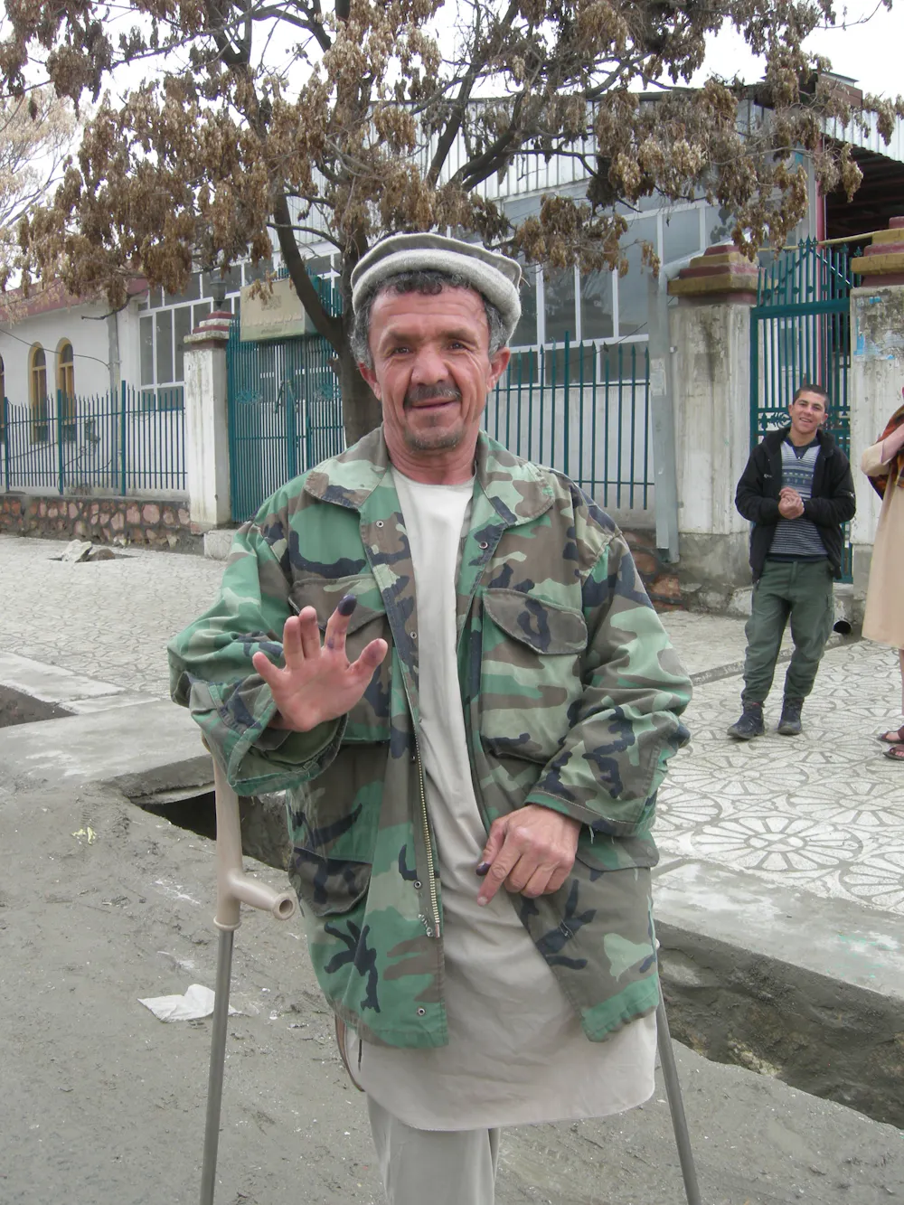 Hope and pride as Afghans turn out in massive numbers to vote for new ...