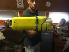 A large, yellow rectangular piece of technology.