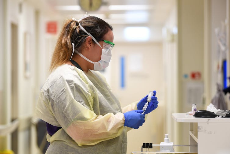 Health-care worker Vanessa Chang in the coronavirus screening clinic at Cabrini private hospital in Melbourne, Tuesday, March 31, 2020.