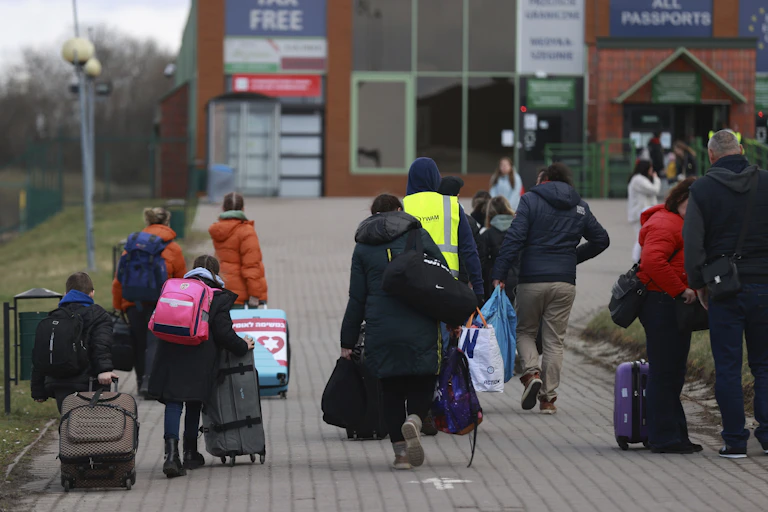 Ukrainian refugees go back to Ukraine in Medyka, Poland.