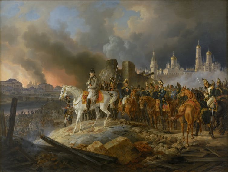 Painting of soldiers on horseback as city burns in background.