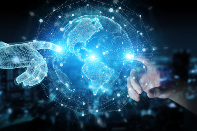 A robot hand and a human hand touch a digital version of a world globe.