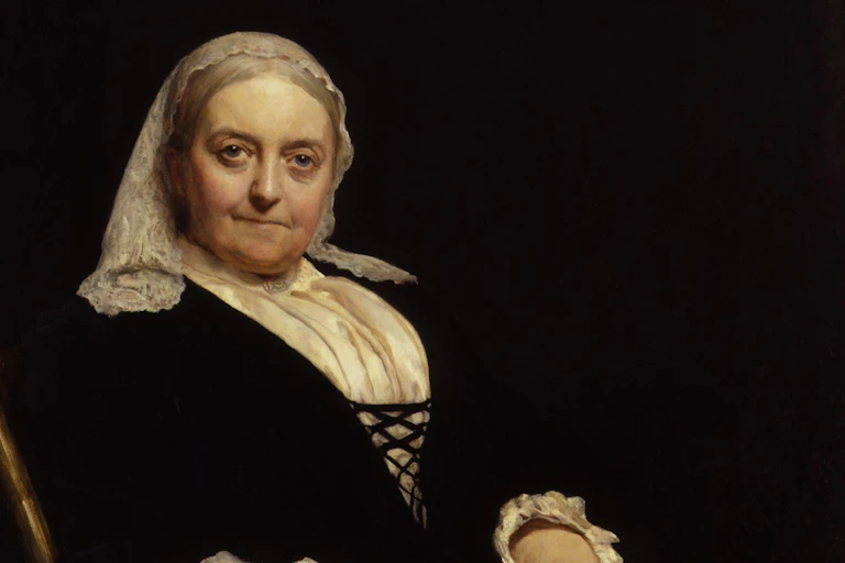 Portrait of an old woman in Victorian dress.
